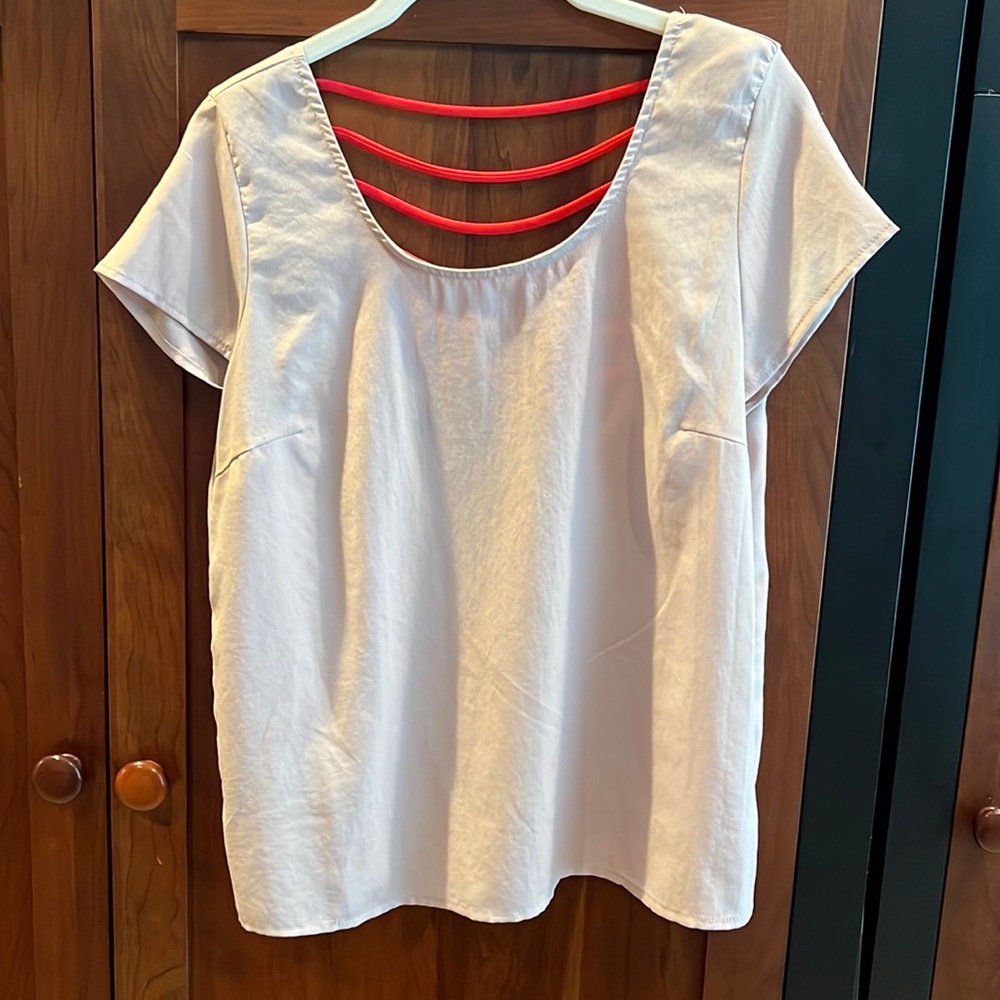 Papaya tan top with bust darts and seven beautiful contrast ribbons across back.